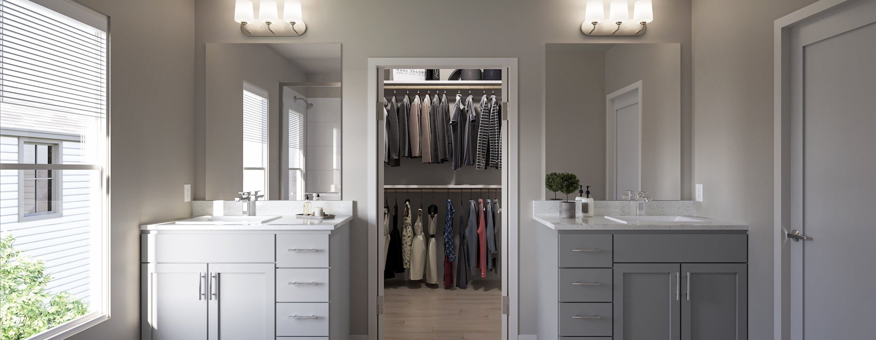 a bathroom with white cabinets